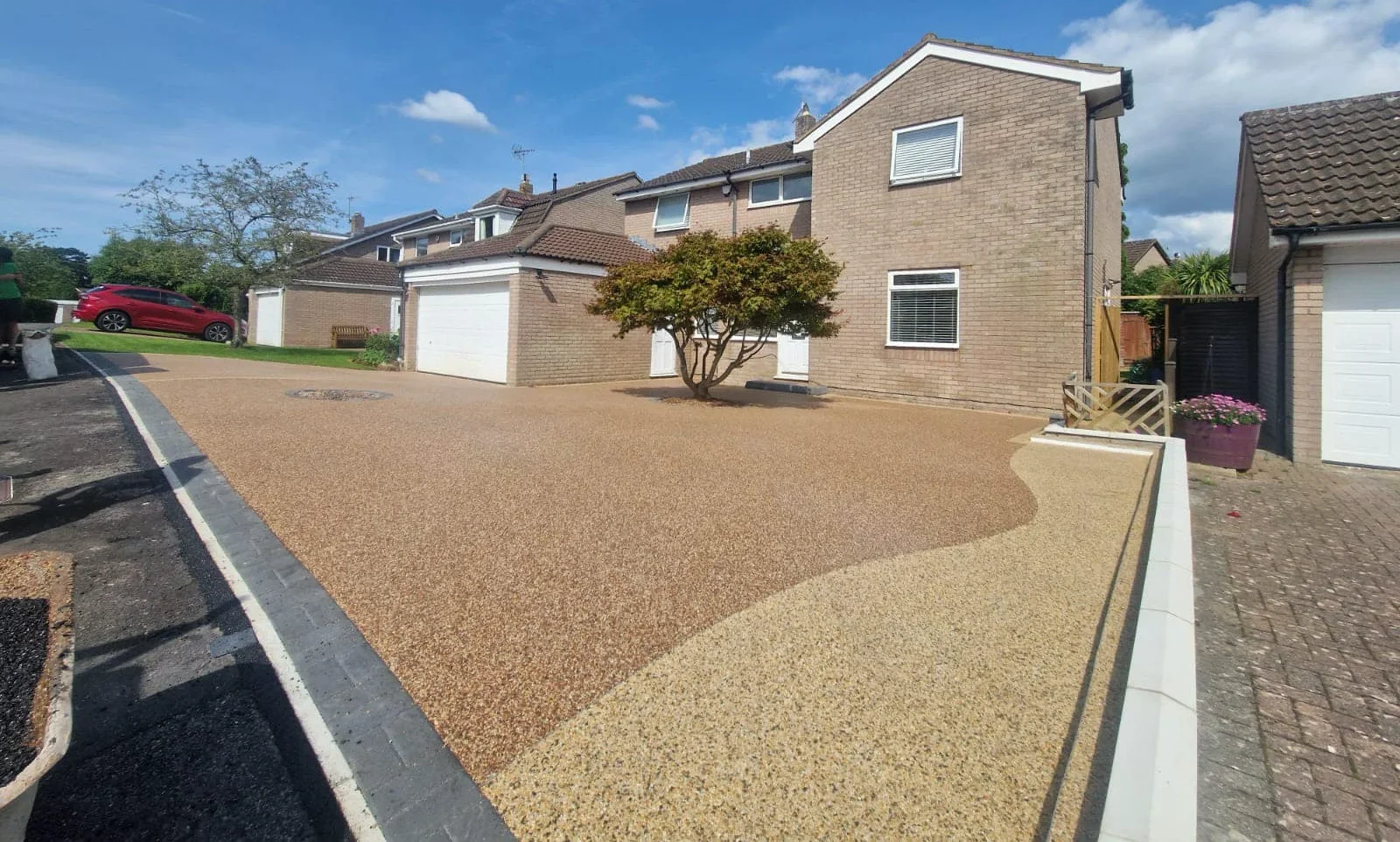 Resin bound driveway in golden tones