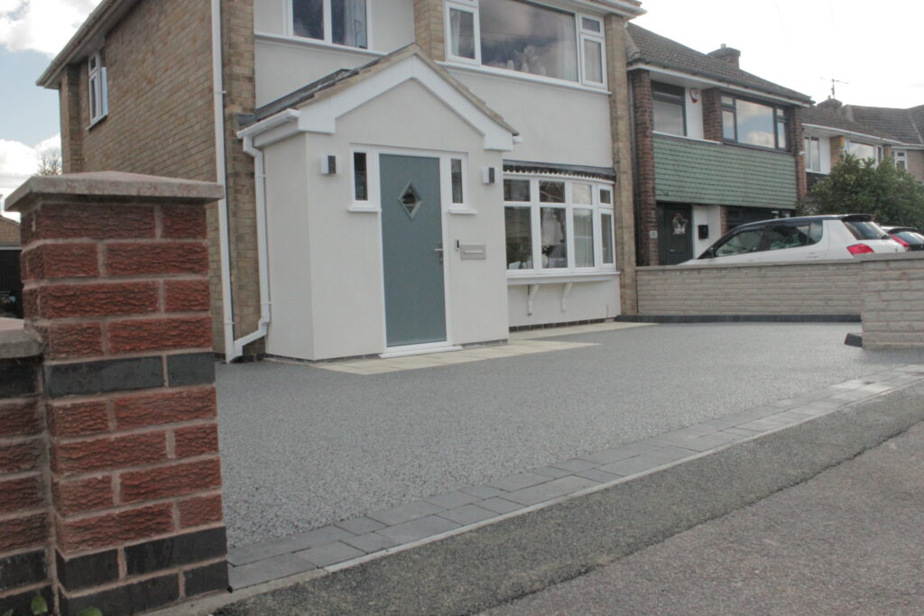 Modern UK detached home with a freshly laid driveway